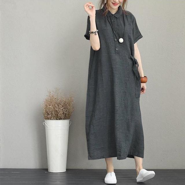 Ayollar uchun keng faso‘nli liboslar ART 0202022 (kichik o‘lchamli) Kulrang 5XL